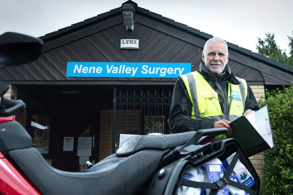 Pharmabike volunteer collecting prescriptions